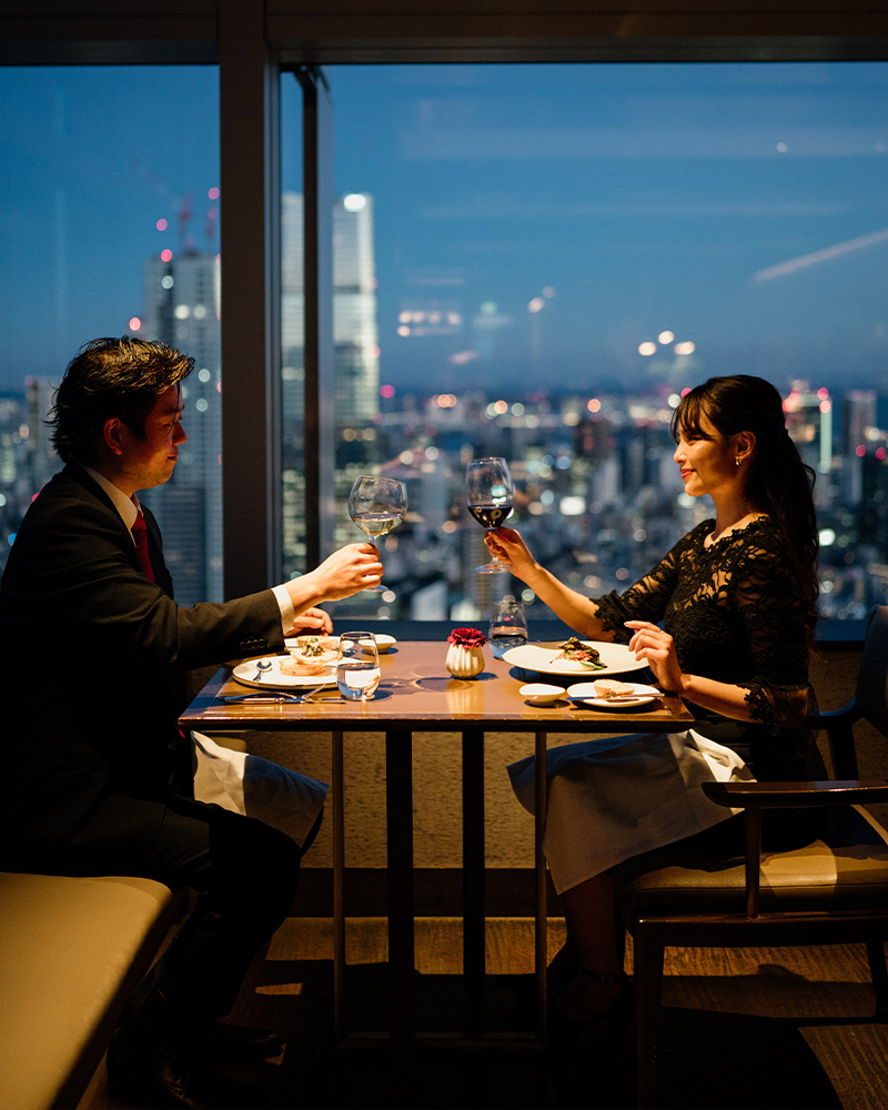 Hotel bar counter overlooking the city at night, video post